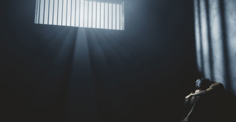 Prisoner in solitary confinement